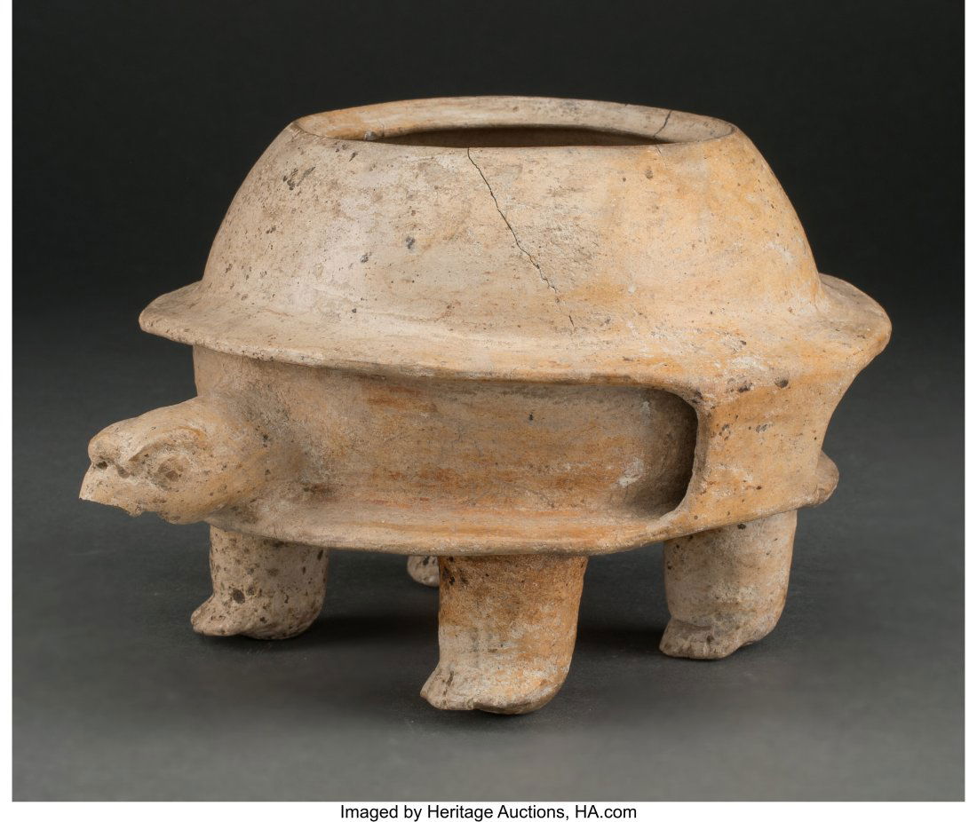 An Olmec Turtle Vessel Las Bocas, Mexico, c. 12: An Olmec Turtle Vessel Las Bocas, Mexico, c. 1200-900 BC A life-size turtle in burnished creamware, its shell and body functioning as a bowl. A flange or strap connecti