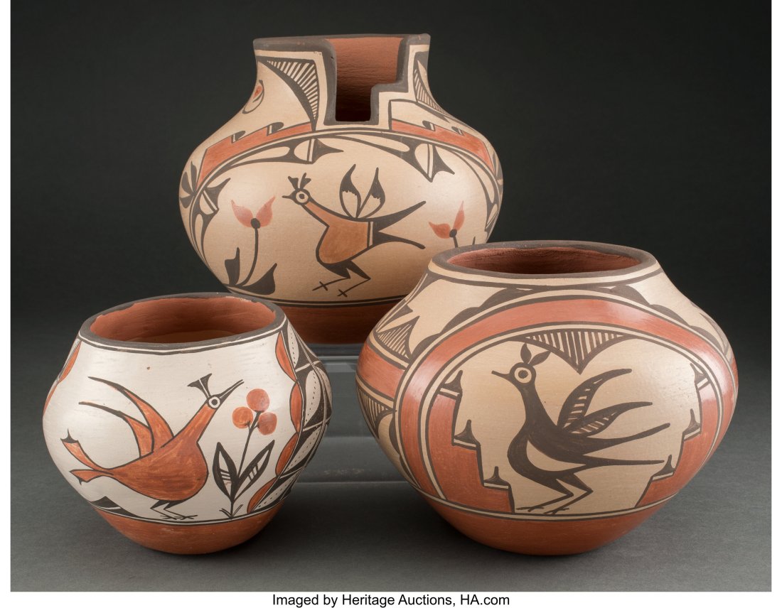 Three Zia Polychrome Jars clay, paint, one sig: Three Zia Polychrome Jars clay, paint, one signed Sophia Medina, Zia; another signed Elizabeth Medina, Zia; the last signed Laura Atkins, Zia Provenance: