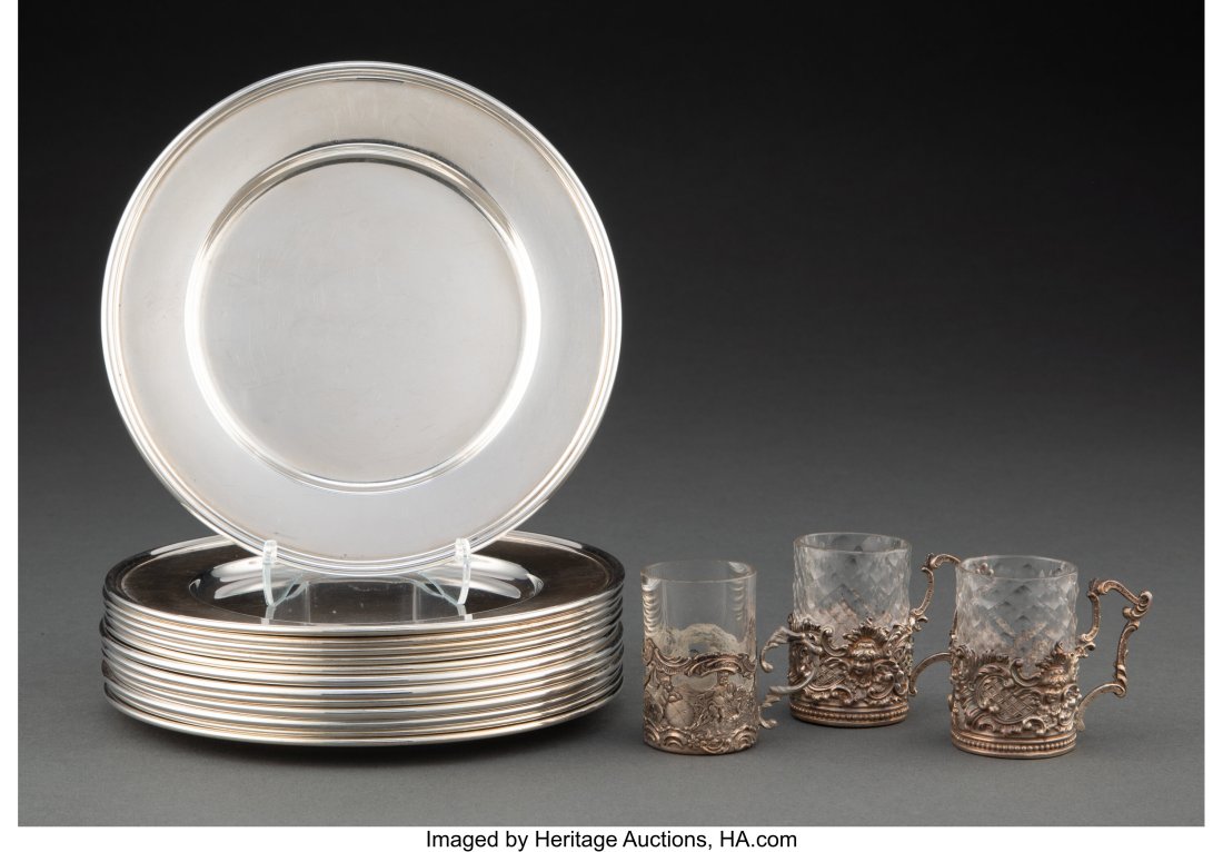 A Group of Thirteen Tiffany & Co. Silver Bread a: A Group of Thirteen Tiffany & Co. Silver Bread and Butter Plates with Three Silver and Glass Cordials Marks: (various) 0-3/8 x 5-3/4 x 5-3/4 inches (1&perio
