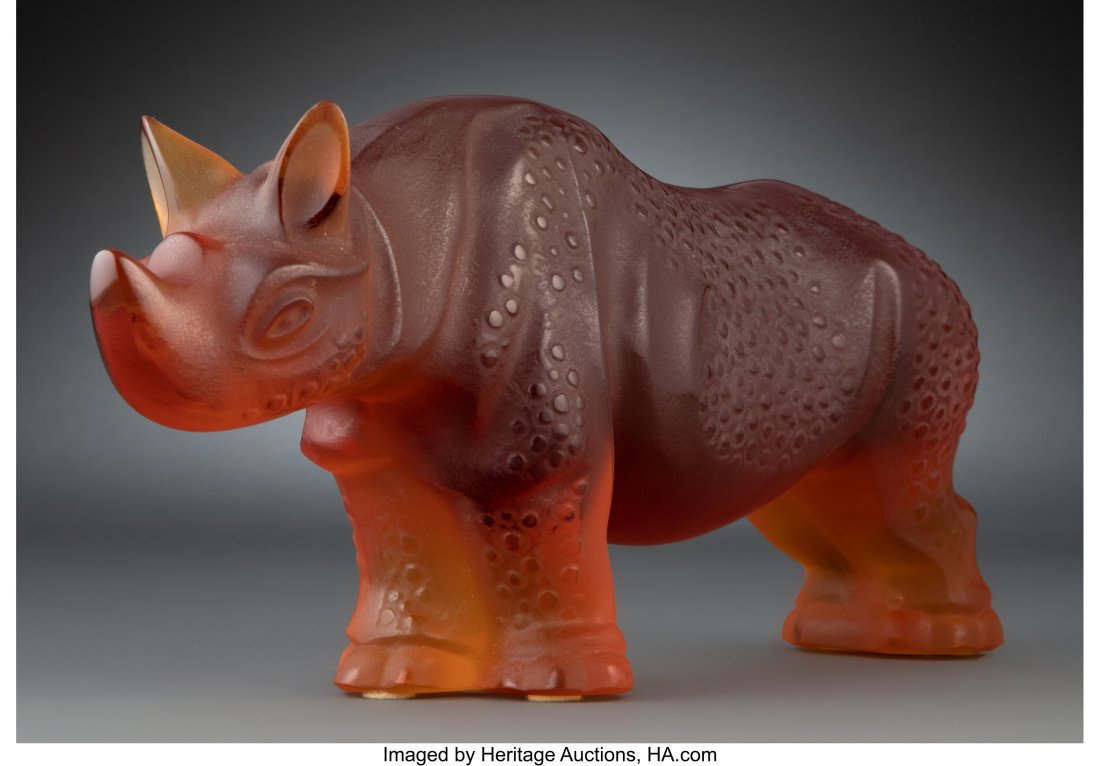Lalique Amber Glass Rhino Sculpture, post-1945 M: Lalique Amber Glass Rhino Sculpture, post-1945 Marks: Lalique France 4-1/2 inches (11.4 cm) HID03101062020 © 2023 Heritage Auctions | All Rights Reserved