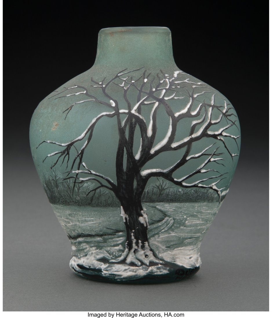 An Andre Delatte Acid-Etched and Enameled Glass: An Andre Delatte Acid-Etched and Enameled Glass Winter Landscape Vase, circa 1930 Marks: DELATTE, NANCY 4-3/4 inches (12.1 cm) HID03101062020 © 2023 Heritag