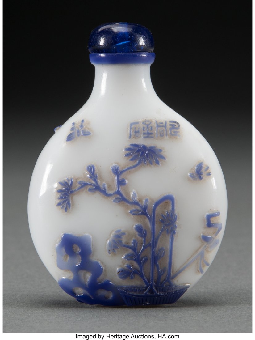 A Chinese Blue Overlay Glass Snuff Bottle, late: A Chinese Blue Overlay Glass Snuff Bottle, late 19th century 2-1/2 x 1-3/4 x 0-3/4 inches (6.4 x 4.4 x 1.9 cm) Property from the Tappan Family Private