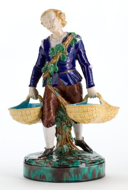 A MINTON MAJOLICA VINTAGER FIGURE Minton, Stoke: A MINTON MAJOLICA VINTAGER FIGURE Minton, Stoke