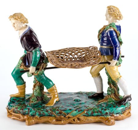 A MINTON MAJOLICA FIGURAL VINTAGER CENTERPIECE M: A MINTON MAJOLICA FIGURAL VINTAGER CENTERPIECE Minton