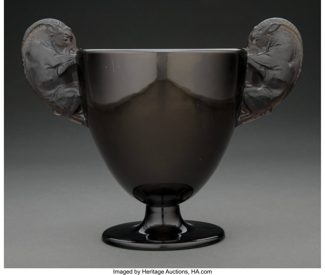 R. Lalique Topaz Glass Béliers Vase, circa 1925: R. Lalique Topaz Glass Béliers Vase, circa 1925 Marks: R. LALIQUE 7-3/8 inches (18.8 cm), M.p. 418, no. 904&perio