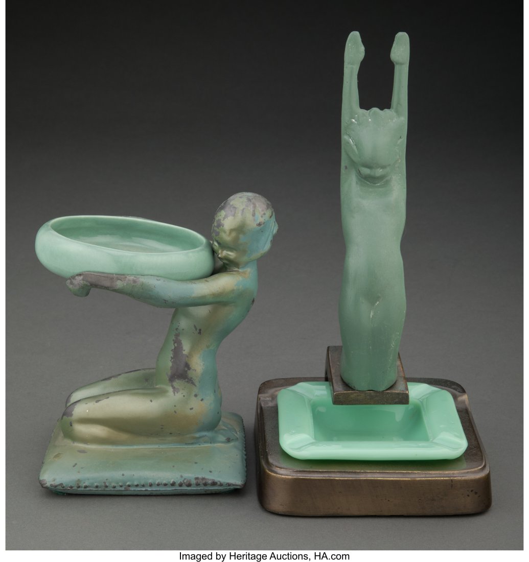 Two Frankart Enameled and Patinated Metal Figura: Two Frankart Enameled and Patinated Metal Figural Ashtrays, circa 1925 Marks: (various) 8-7/8 x 4-1/8 x 4-3/4 inches (22.5 x 10.5 x 12 cm) (tallest) The group comprising: 1 ashtray with ceramic insert