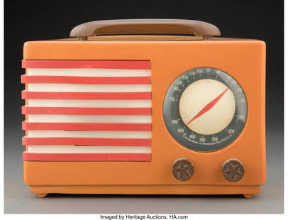 67152: Norman Bel Geddes (American, 1893-1958) Model 40: Norman Bel Geddes (American, 1893-1958) Model 400 'Aristocrat' Radio, 1940, Emerson Radio & Phonograph Corporation Orange, red and brown catalin 8 x 10-3/4 x