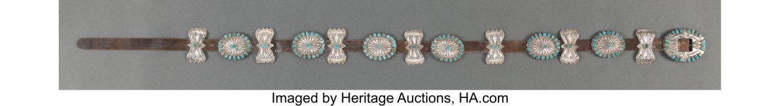A Navajo Concho Belt Jack Adakai c. 1960 stamp: A Navajo Concho Belt Jack Adakai c. 1960 stamped J. A., silver, turquoise, copper, commercial leather Lengths: overall, 54 &frac14; in