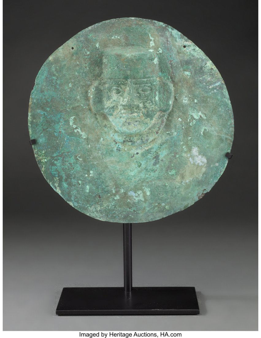 A Large Moche Pectoral Disc  Peru, Early Period, (1 of 2)
