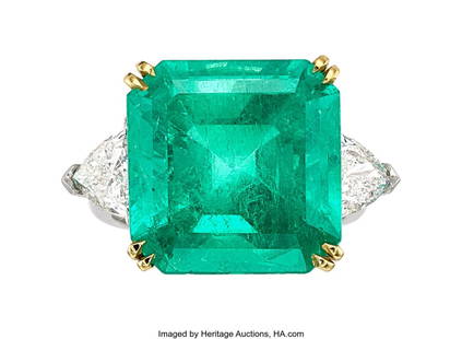 55102: Colombian Emerald, Diamond, Platinum, Gold Ring : Colombian Emerald, Diamond, Platinum, Gold Ring Stones: Emerald-cut emerald weighing 15.05 carats; shield-shaped diamonds weighing a total of approximately 2&period