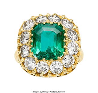 55115: Colombian Emerald, Diamond, Gold Ring Stones: E: Colombian Emerald, Diamond, Gold Ring Stones: Emerald-cut emerald weighing 3.76 carats; full-cut diamonds weighing a total of 2.25 carats Metal: 18k and 14k