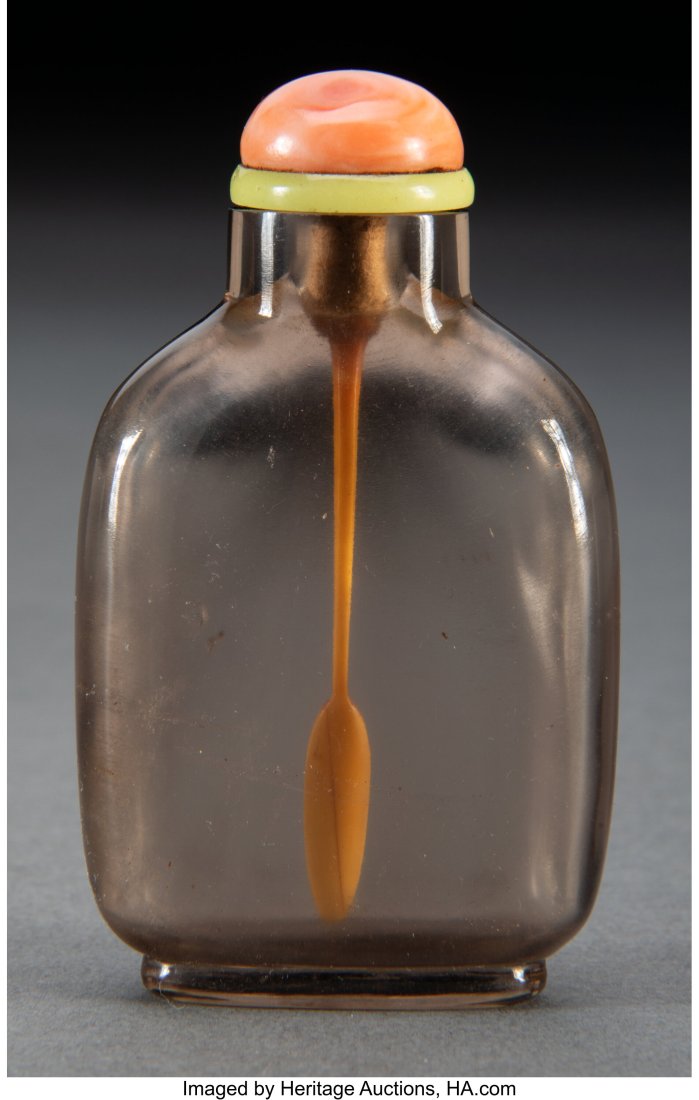 A Chinese Smoke Crystal Snuff Bottle 2-7/8 x 1-5: A Chinese Smoke Crystal Snuff Bottle 2-7/8 x 1-5/8 x 0-5/8 inches (7.3 x 4.1 x 1.6 cm) HID03101062020 © 2023 Heritage Auctions | All Rights Reserve