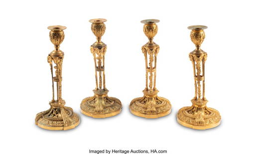 61010: A Collection of Four Assembled Neoclassical Gilt: A Collection of Four Assembled Neoclassical Gilt Bronze Candlesticks, 19th century 11 x 5 inches (27.9 x 12.7 cm) (tallest) HID03101062020 © 2024 Heritage Auctions | All Rights Reserved