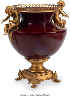 61014: A Gilt Bronze-Mounted Ox Blood Porcelain Urn, 19: A Gilt Bronze-Mounted Ox Blood Porcelain Urn, 19th century 22 x 21 x 17 inches (55.9 x 53.3 x 43.2 cm) HID03101062020 © 2024 Heritage Auctions | All Rights Reserved