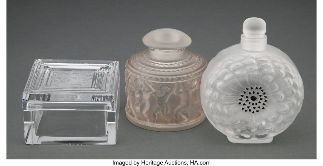 Three Lalique Clear and Frosted Glass Table Arti: Three Lalique Clear and Frosted Glass Table Articles, circa 1945 Marks: Lalique France 5-1/2 inches (14.0 cm) (tallest) The lot comprising: 1 Dahlia pe