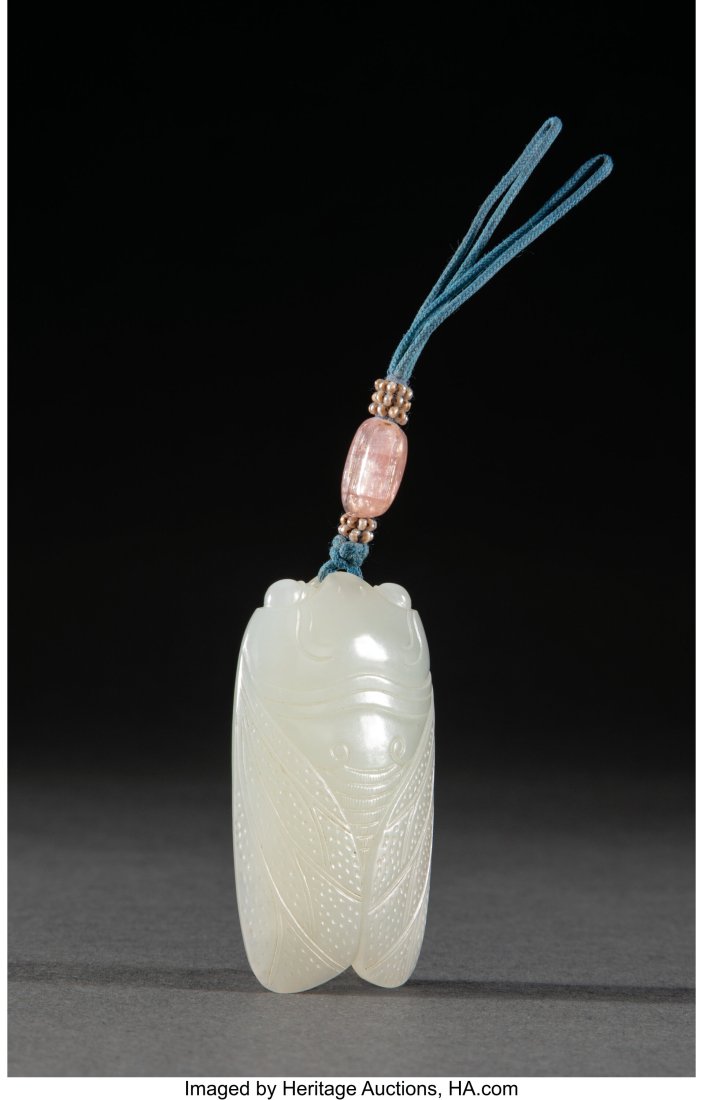 A Chinese Carved Jade Cicada 4-3/4 x 1-1/4 x 0-3: A Chinese Carved Jade Cicada 4-3/4 x 1-1/4 x 0-3/4 inches (12.1 x 3.2 x 1.9 cm) HID03101062020 © 2024 Heritage Auctions | All Rights Reserved