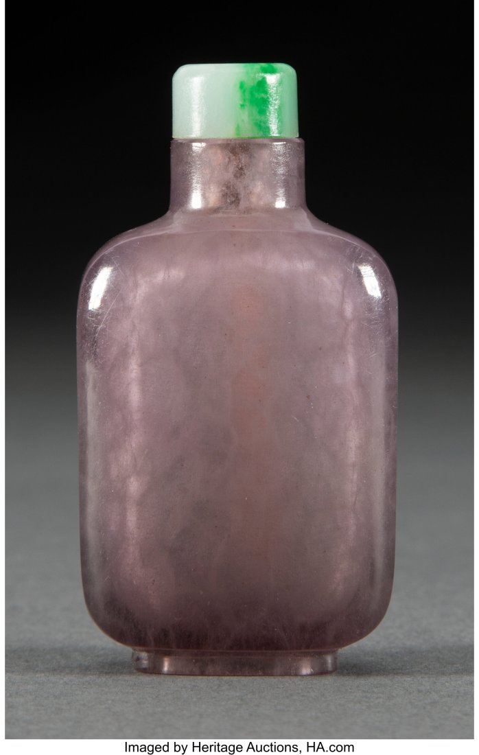 A Chinese Carved Quartz Snuff Bottle 2-5/8 x 1-3: A Chinese Carved Quartz Snuff Bottle 2-5/8 x 1-3/8 x 0-7/8 inches (6.7 x 3.5 x 2.2 cm) HID03101062020 © 2024 Heritage Auctions | All Rights Reserve