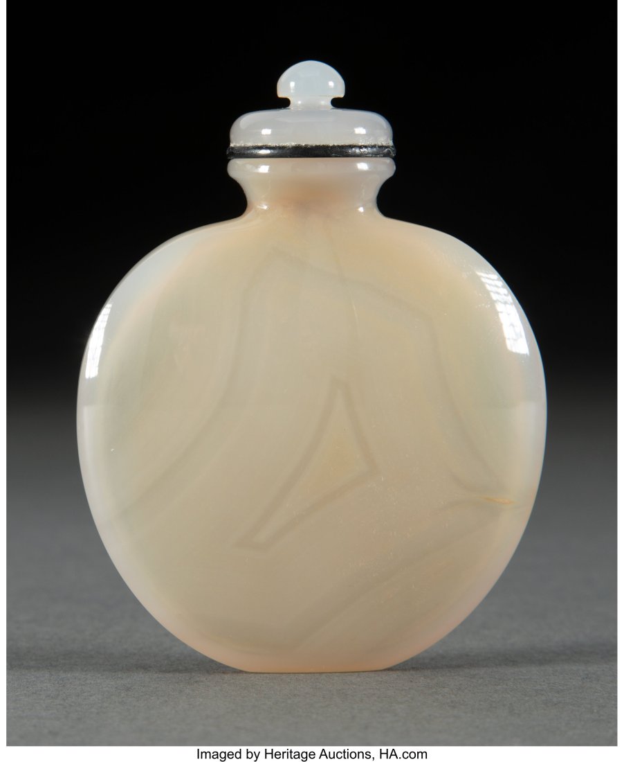 A Chinese Carved Agate Snuff Bottle 3 x 2-1/4 x: A Chinese Carved Agate Snuff Bottle 3 x 2-1/4 x 0-3/4 inches (7.6 x 5.7 x 1.9 cm) HID03101062020 © 2024 Heritage Auctions | All Rights Reserved