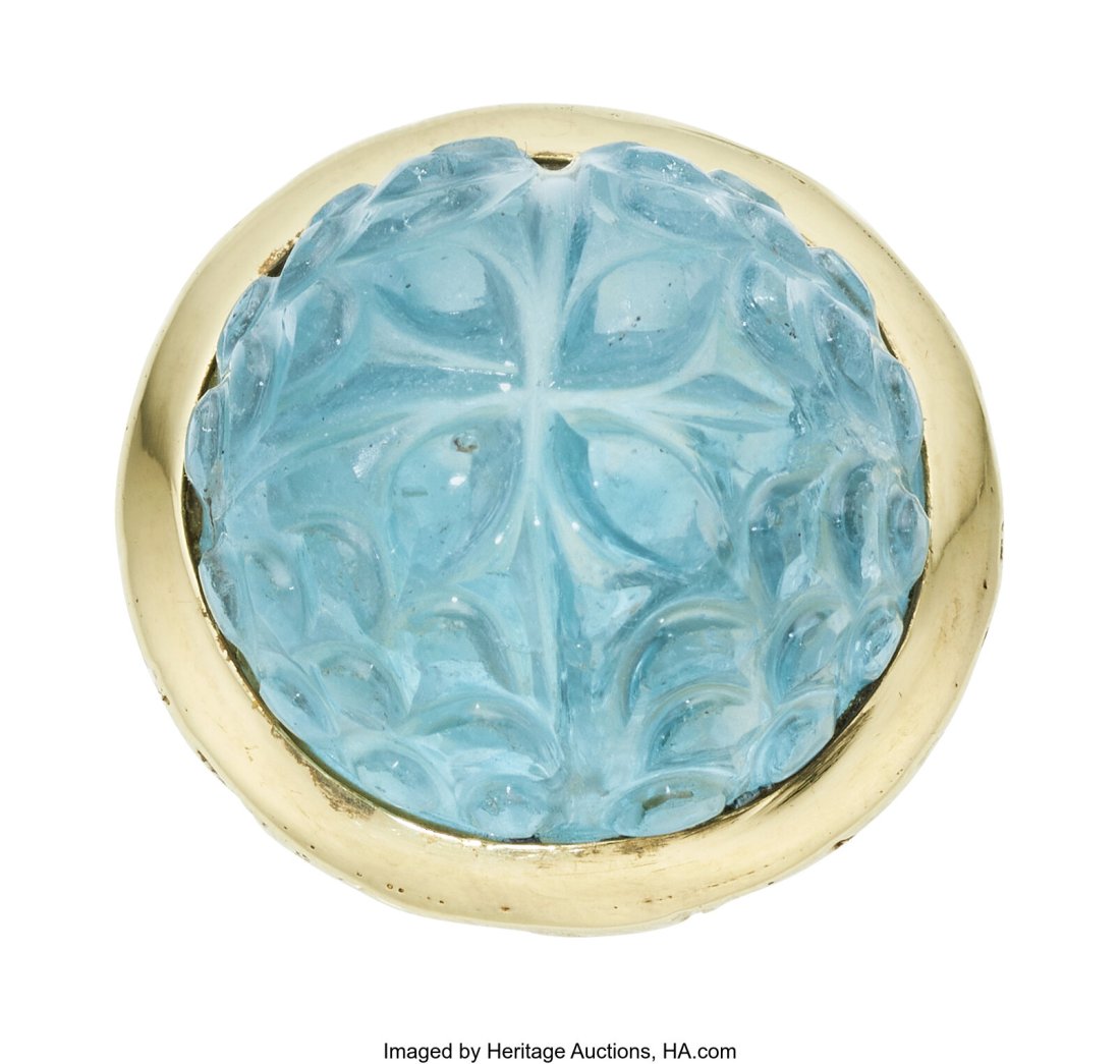 Aquamarine, Gold Ring Stones: Carved aquamarine: Aquamarine, Gold Ring Stones: Carved aquamarine Metal: 14k gold Gross Weight: 28.60 grams Size: 6-1/2 (*sizeable) HID03101062020 © 2024 Heri