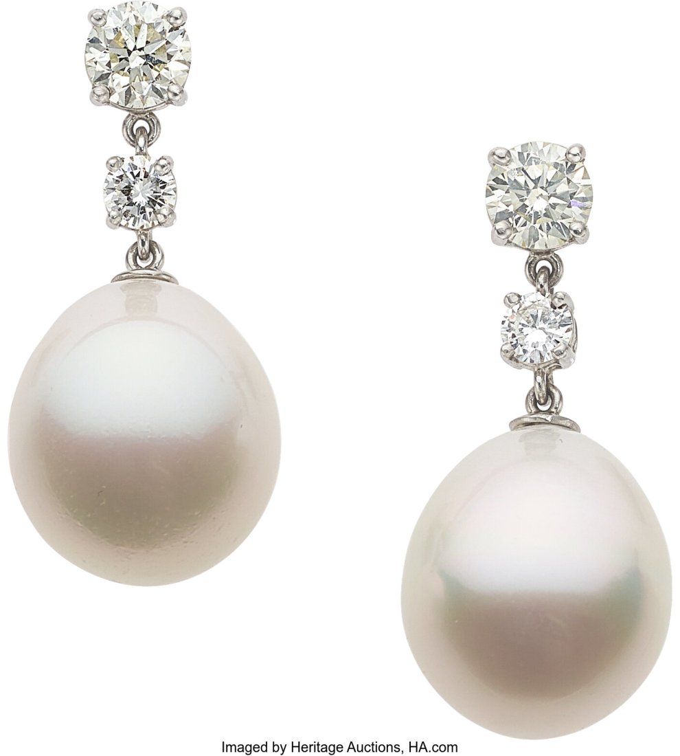 South Sea Cultured Pearl, Diamond, Platinum, Go: South Sea Cultured Pearl, Diamond, Platinum, Gold Earrings Stones: Round brilliant and full-cut diamonds weighing a total of 2.00 carats Pearls: South Sea cultured