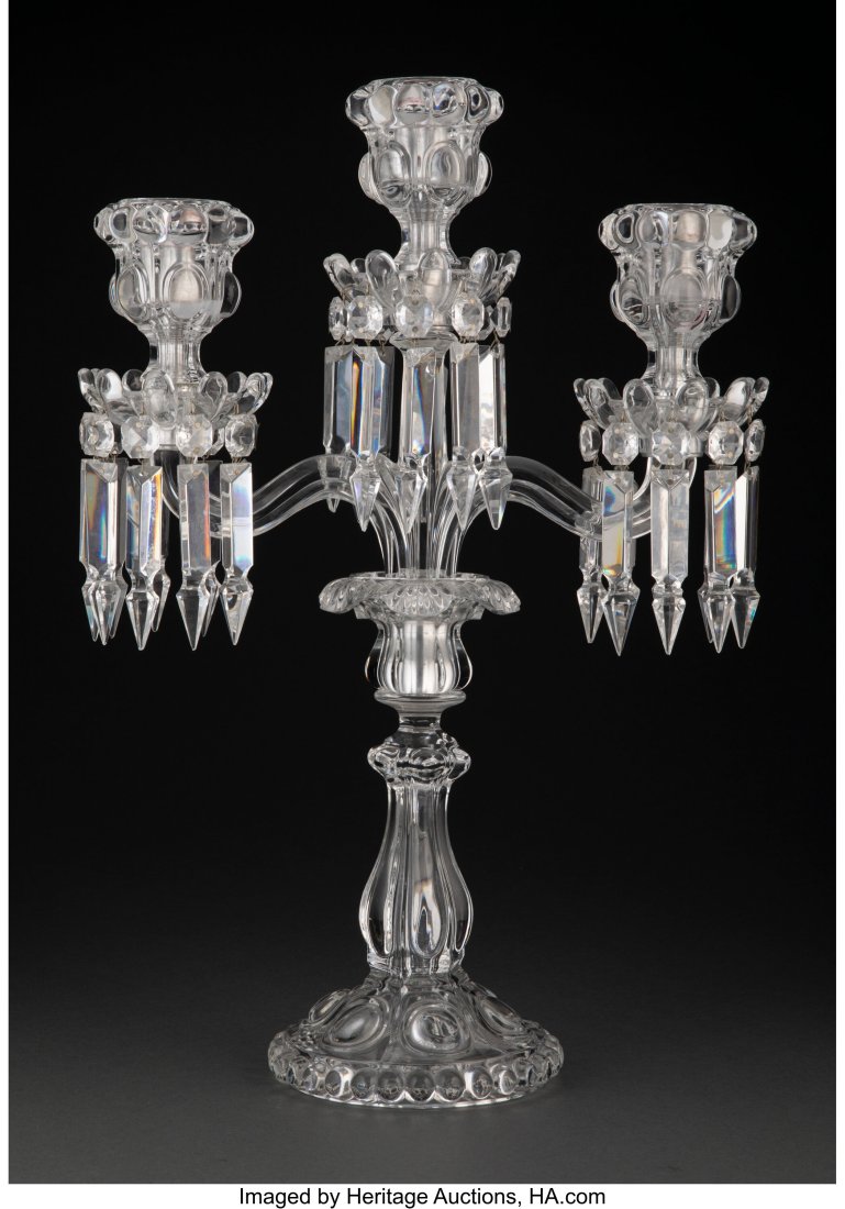 A Baccarat Three-Light Glass Candelabrum Marks: A Baccarat Three-Light Glass Candelabrum Marks: BACCARAT, BACCARAT (goblet-decanter-cup) FRANCE 18-1/4 x 13 inches (46.4 x 33.0 cm) The Estate of Jane