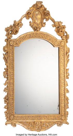 61032&colon; A George II Carved Gilt Wood Mirror&comma; mid-18th ce