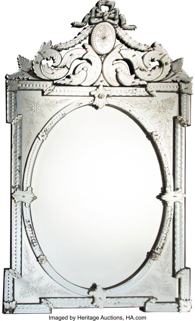 A Hollywood Regency Venetian Glass Mirror, 20th: A Hollywood Regency Venetian Glass Mirror, 20th century 69 x 37 x 1-3/4 inches (175.3 x 94.0 x 4.4 cm) Property from the Estate of Mr. and Mrs. Robert Morris Graham Sr., El Paso, Texas HID03101062020