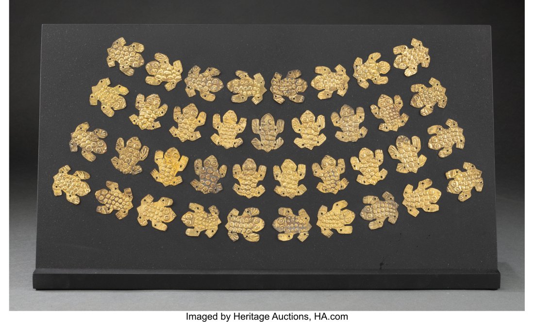 32 Moche Gold Frog Ornaments Peru, c. 100-300 A: 32 Moche Gold Frog Ornaments Peru, c. 100-300 AD The charming amphibians cut from thin gold sheets, each with repousse work indicating eyes, bumps on back, and toes&peri