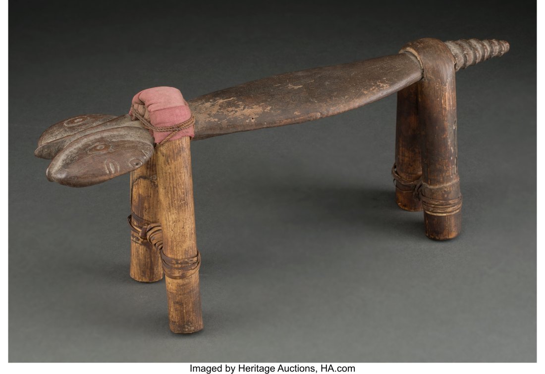 An Abelam Headrest Maprik Village region, East : An Abelam Headrest Maprik Village region, East Sepik Province, Papua New Guinea, late 19th to early 20th century Constructed from a piece of hardwood as the headrest, one end c