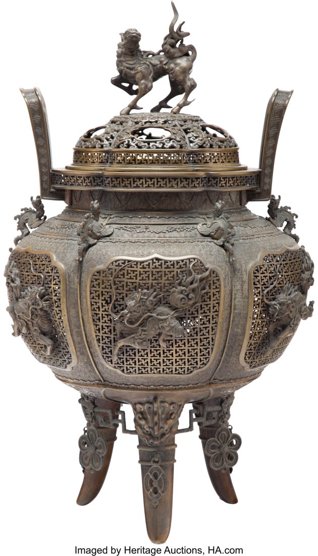 A Japanese Reticulated Bronze Censer with Molded: A Japanese Reticulated Bronze Censer with Molded Kirin-Forms, Meiji Period Marks: Nine-character mark 27-1/4 x 18 x 18 inches (69.2 x 45.7 x 45.7 cm) HID