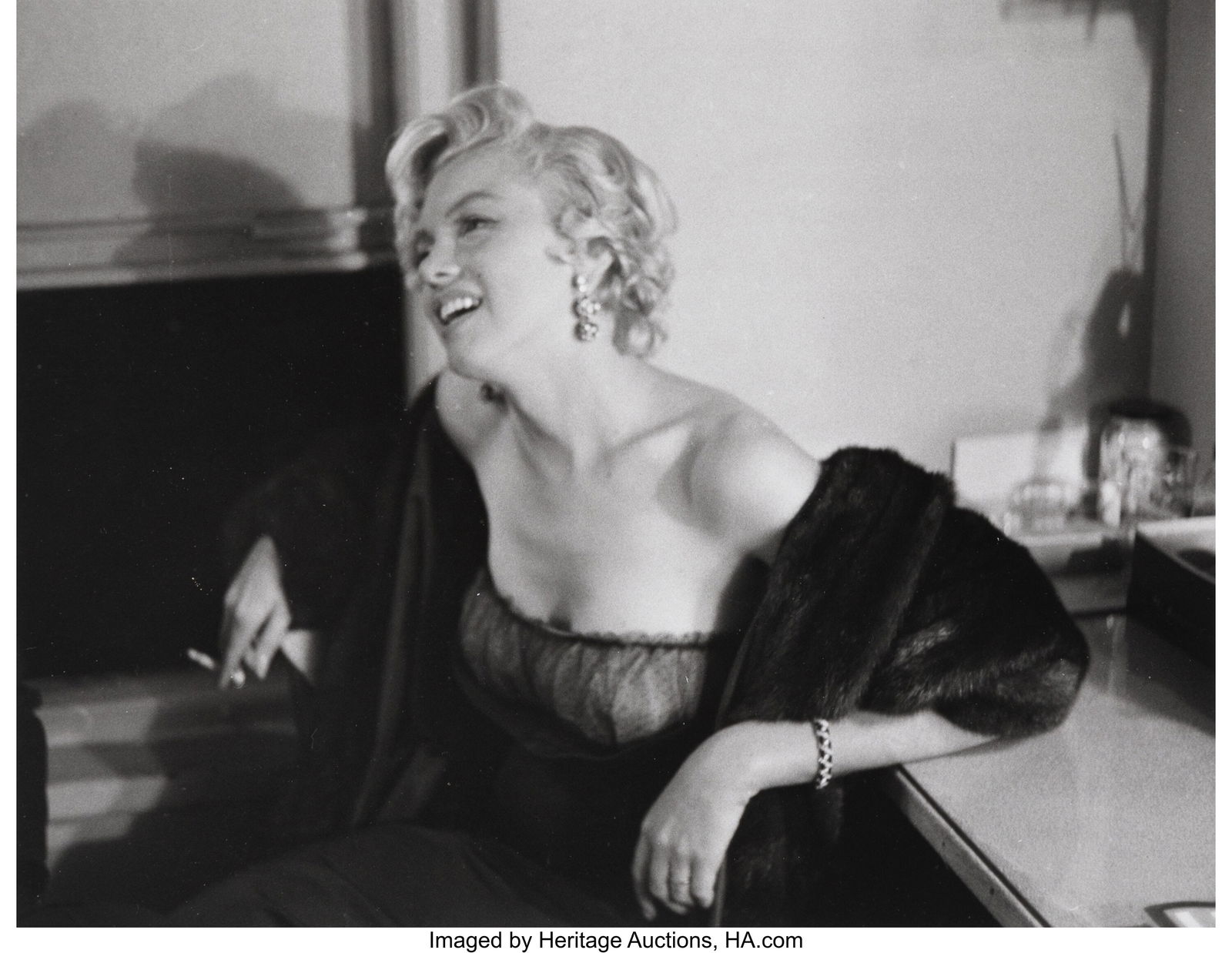 Sam Shaw (American, 1912-1999) Marilyn with a Ci: Sam Shaw (American, 1912-1999) Marilyn with a Cigarette at the St. Regis Hotel, New York City, 1954 Gelatin silver print, printed later 6-1/4 x 8 inches &l