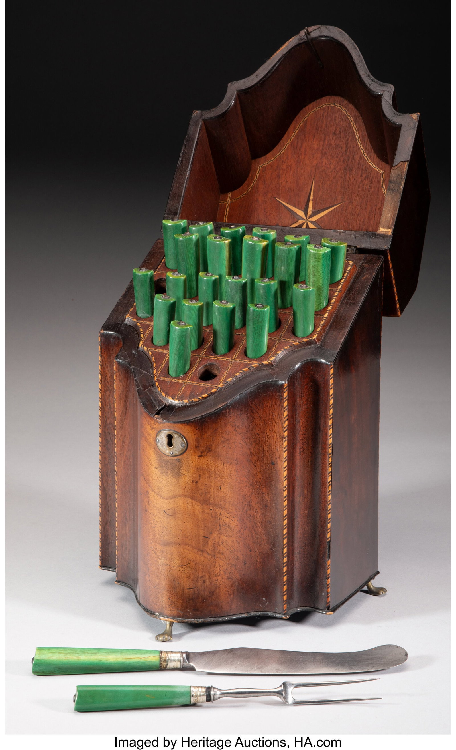 A Mahogany Knife Box Accompanied by Knives and C: A Mahogany Knife Box Accompanied by Knives and Carving Forks, 19th century 14-1/8 x 8-1/4 x 6-1/4 inches (35.9 x 21.0 x 15.9 cm) The lot comprising&col