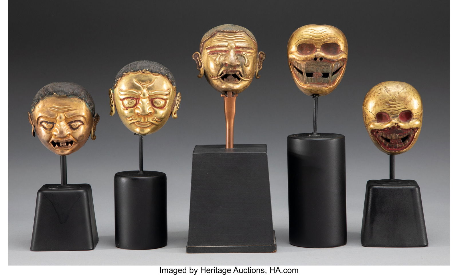 A Group of Five Tibetan Gilt Bronze Heads on Sta (1 of 4)
