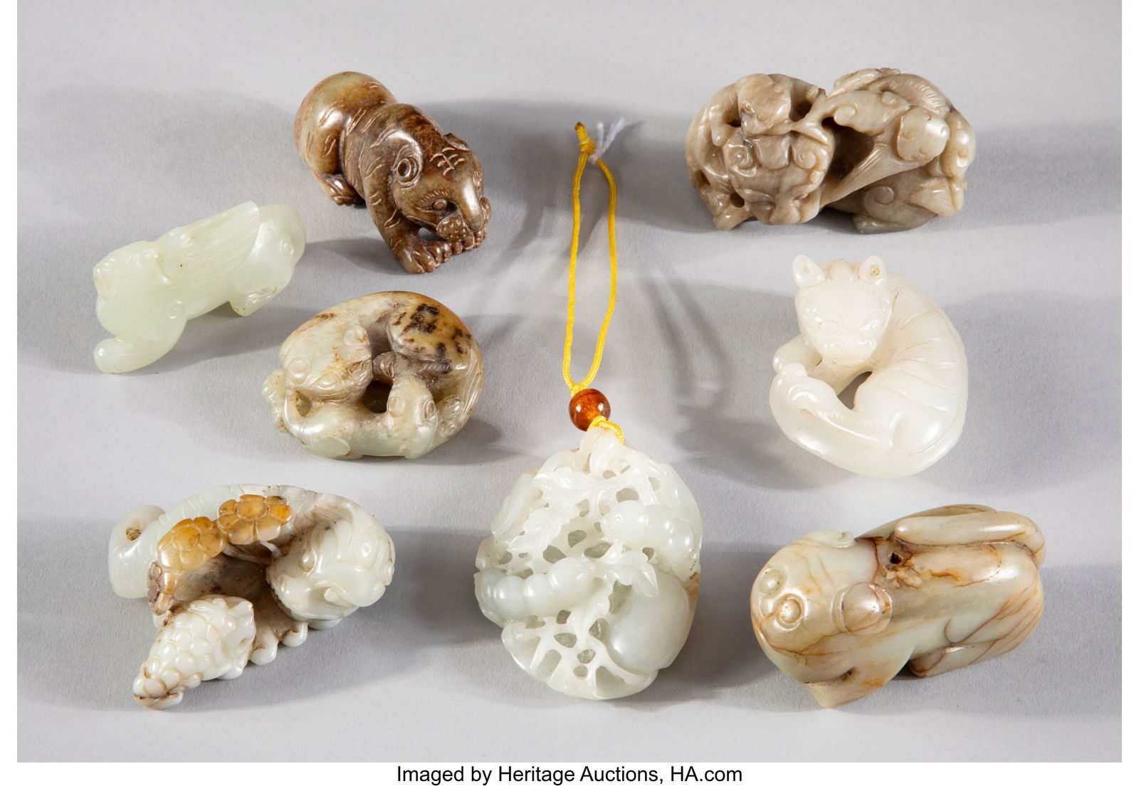 A Group of Eight Chinese Jade Carvings 1-1/4 x 2 (1 of 3)