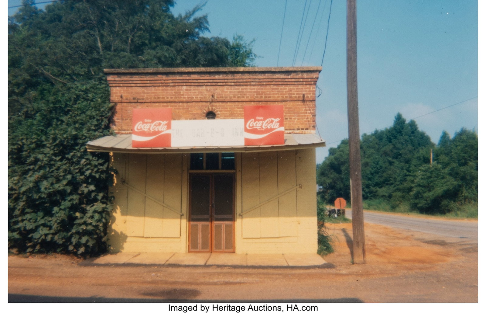 William Christenberry Jr. (American, b. 1936) Th: William Christenberry Jr. (American, b. 1936) The Bar - B Q Inn, Greensboro, Alabama, 1976 Dye coupler print 3-1/4 x 4-7/8 inches (8&period