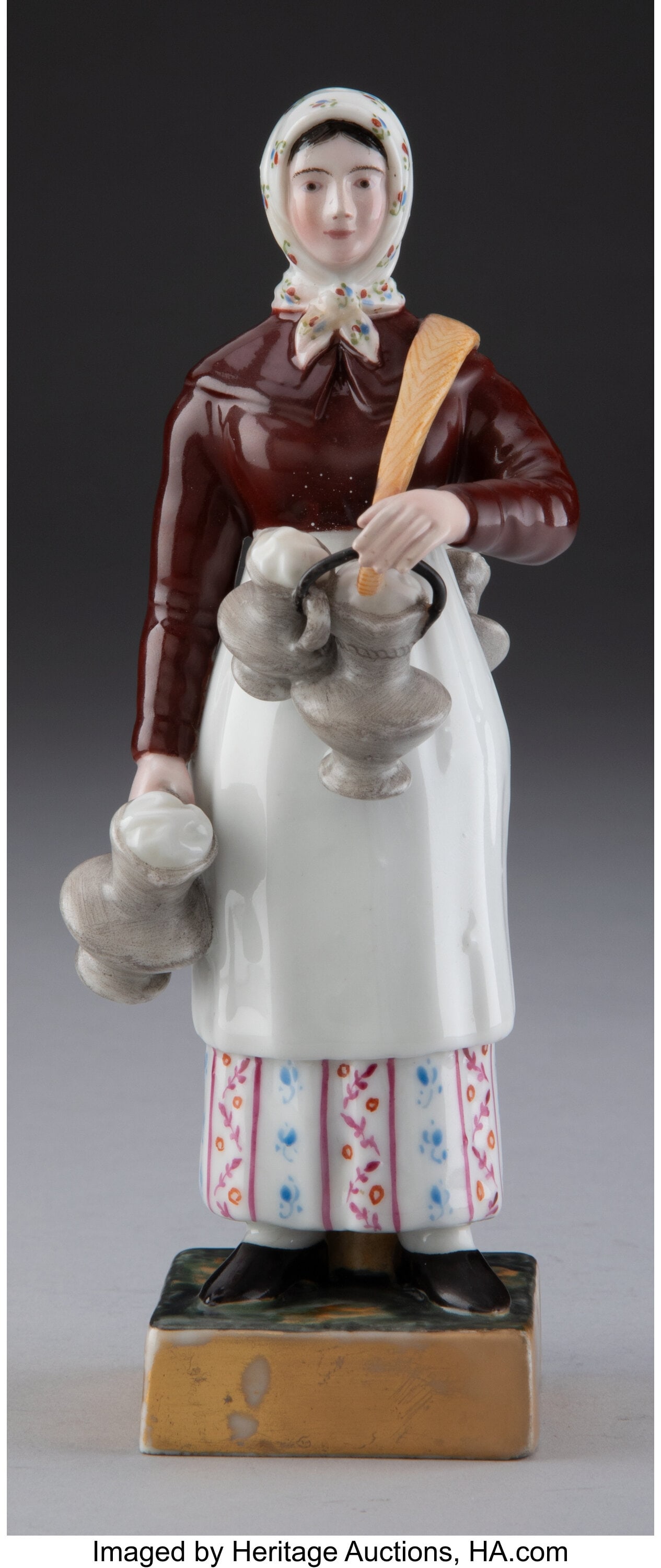 A Gardner Porcelain Factory Figure: A Woman With: A Gardner Porcelain Factory Figure: A Woman With Jugs, Verbilki, early 19th century Marks: (blue underglaze factory mark) 6-3/4 x 2-3/8 x 3-1/2 inches (17.1 x 6.0 x 8.9 cm) Property from the Nelkin Co