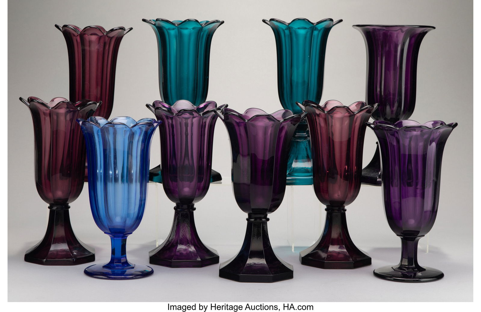 A Group of Ten American Colored Glass Tulip-Form: A Group of Ten American Colored Glass Tulip-Form Celery Vases, mid-19th century 10-3/4 x 5-1/2 inches (27.3 x 14.0 cm) (tallest) PROVENANCE: Rago