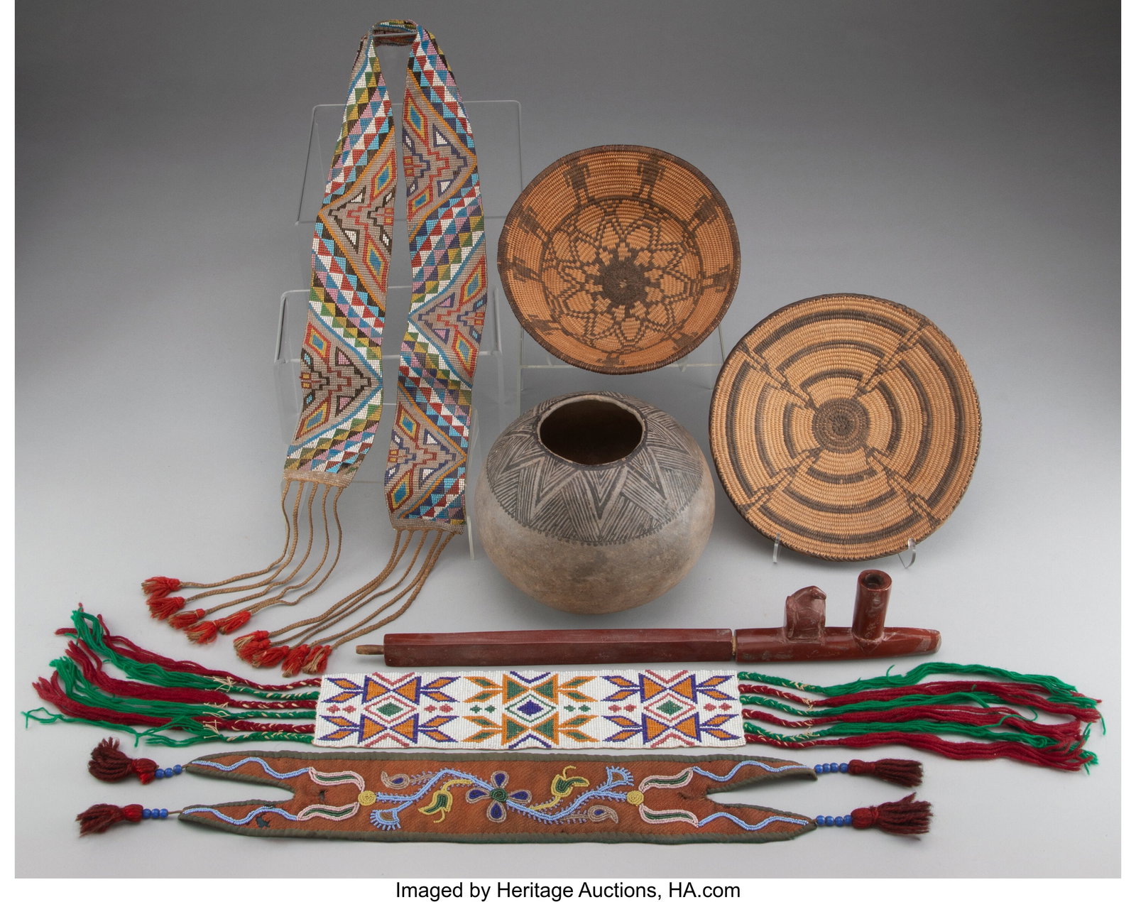A Group of Seven American Indian Artifacts 6 x 8: A Group of Seven American Indian Artifacts 6 x 8 inches (15.2 x 20.3 cm) (largest, pot) The group comprising: 1 Anasazi pot; 2 Southwest baskets&semi