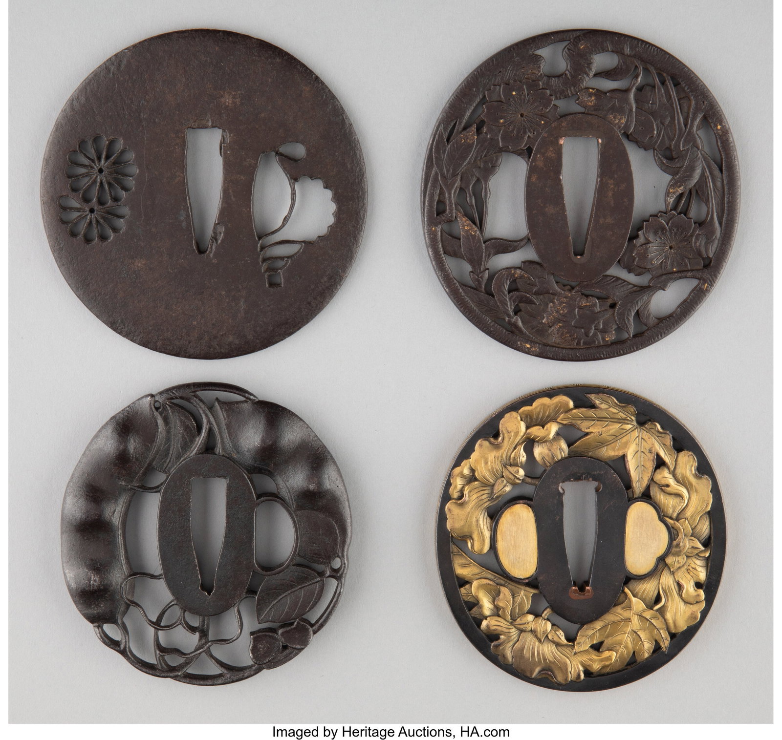 A Group of Four Japanese Tsuba Marks to two: Bus: A Group of Four Japanese Tsuba Marks to two: Bushu-ju Masachika, Inshu Suruga 3 inches (7.6 cm) diam. of largest The group comprising: 1 gilt example marked B