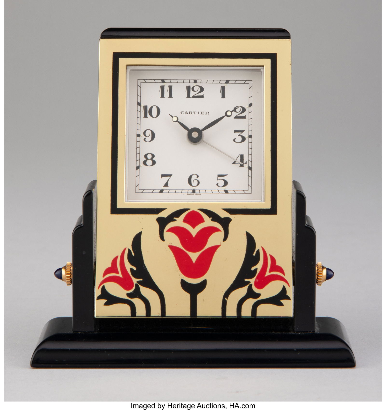 A Cartier Enameled Brass, Onyx, and Hardstone Pe: A Cartier Enameled Brass, Onyx, and Hardstone Pendulette Clock, circa 1990 Marks to back: Cartier, Quartz, SWISS MADE, 890702176 Marks to face: CARTIER&