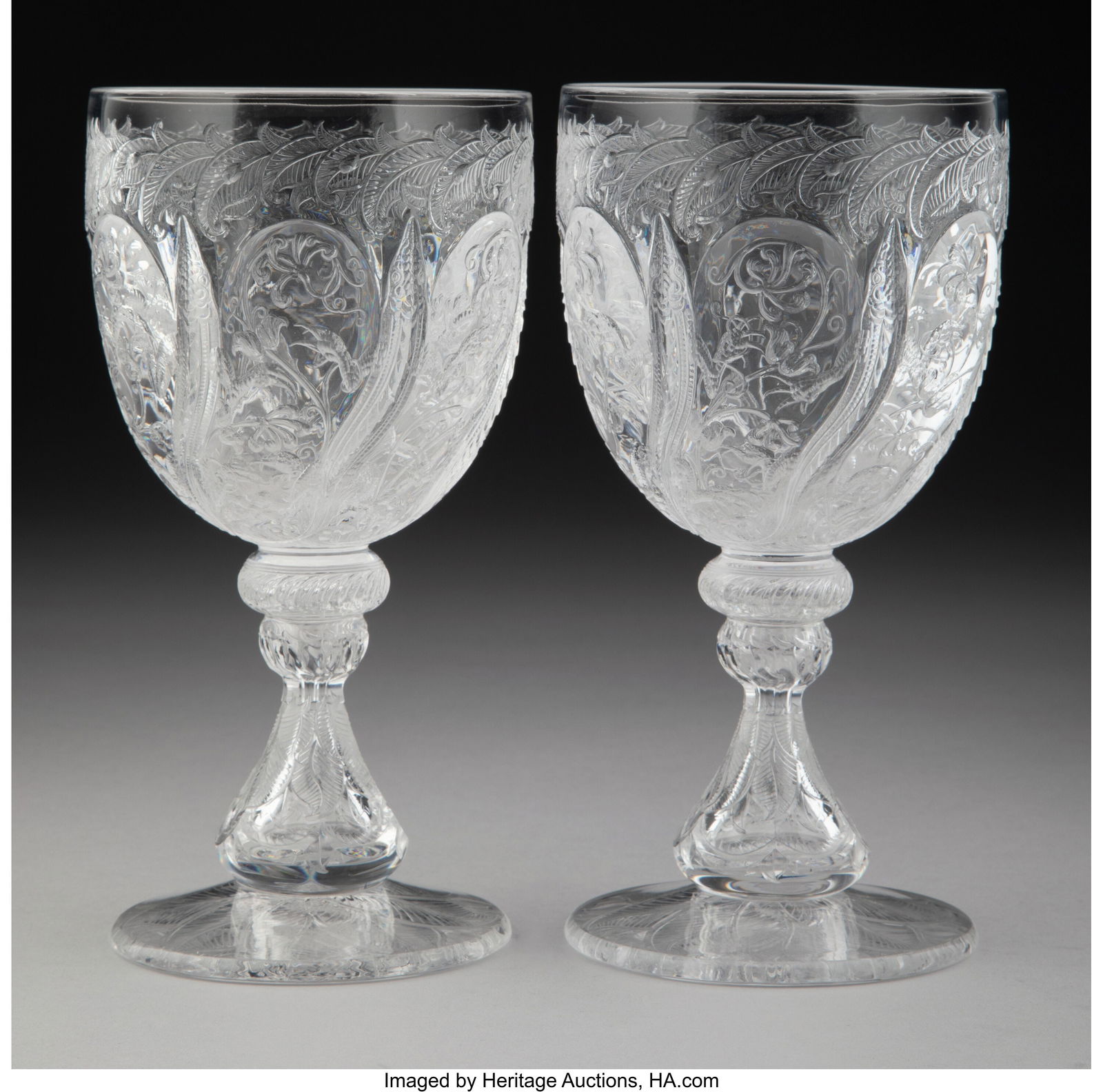 A Pair of Continental Cut and Engraved Water Gob: A Pair of Continental Cut and Engraved Water Goblets, circa 1870 7-1/8 x 3-5/8 x 3-5/8 inches (18.1 x 9.2 x 9.2 cm) (each) Property from the
