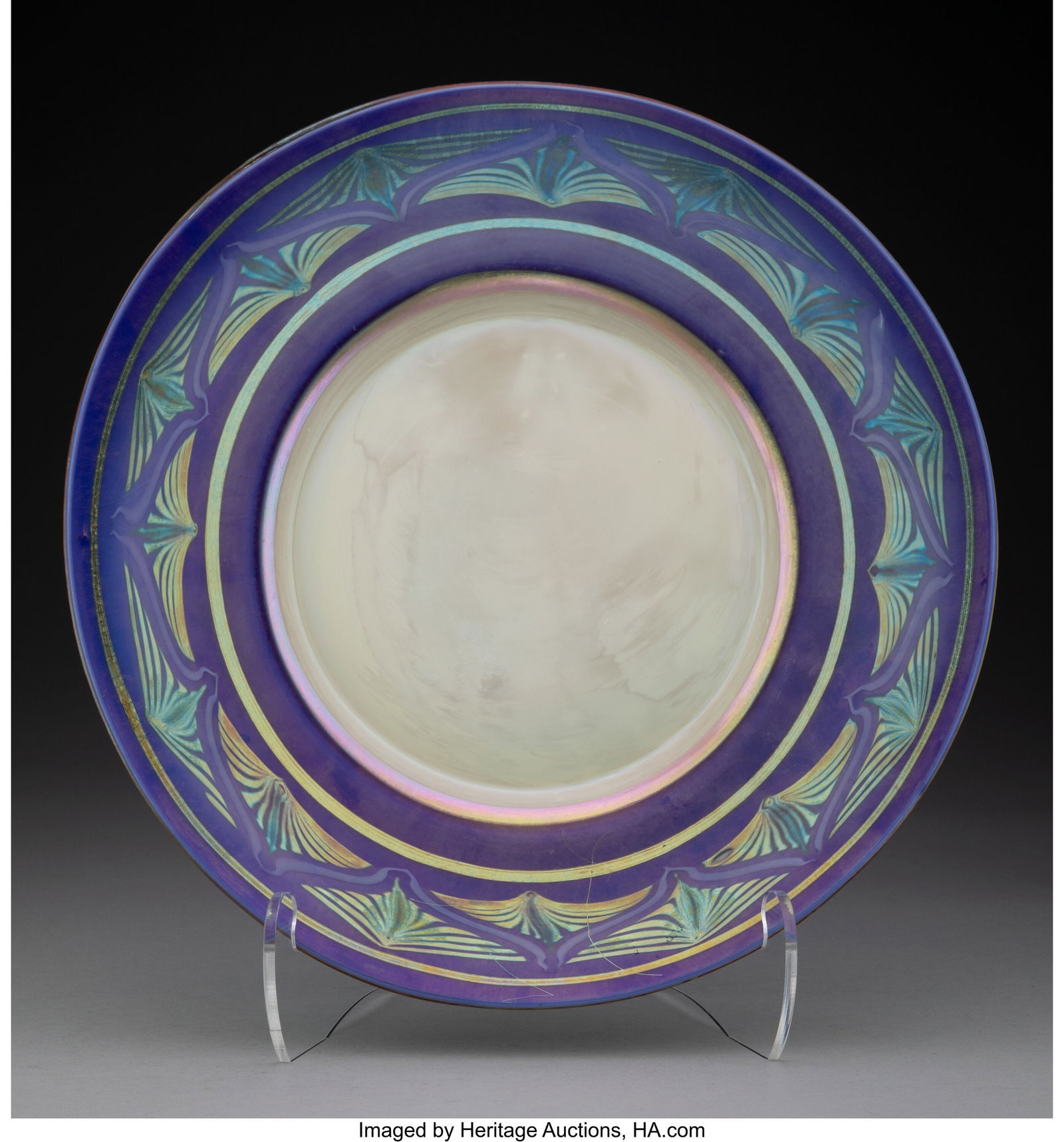 A Tiffany Studios Decorated Favrile Glass Platte: A Tiffany Studios Decorated Favrile Glass Platter, circa 1910 Marks: 2490J, L. C. Tiffany-Favrile 1-1/2 x 12-3/4 inches (3.8 x 32.4 cm)