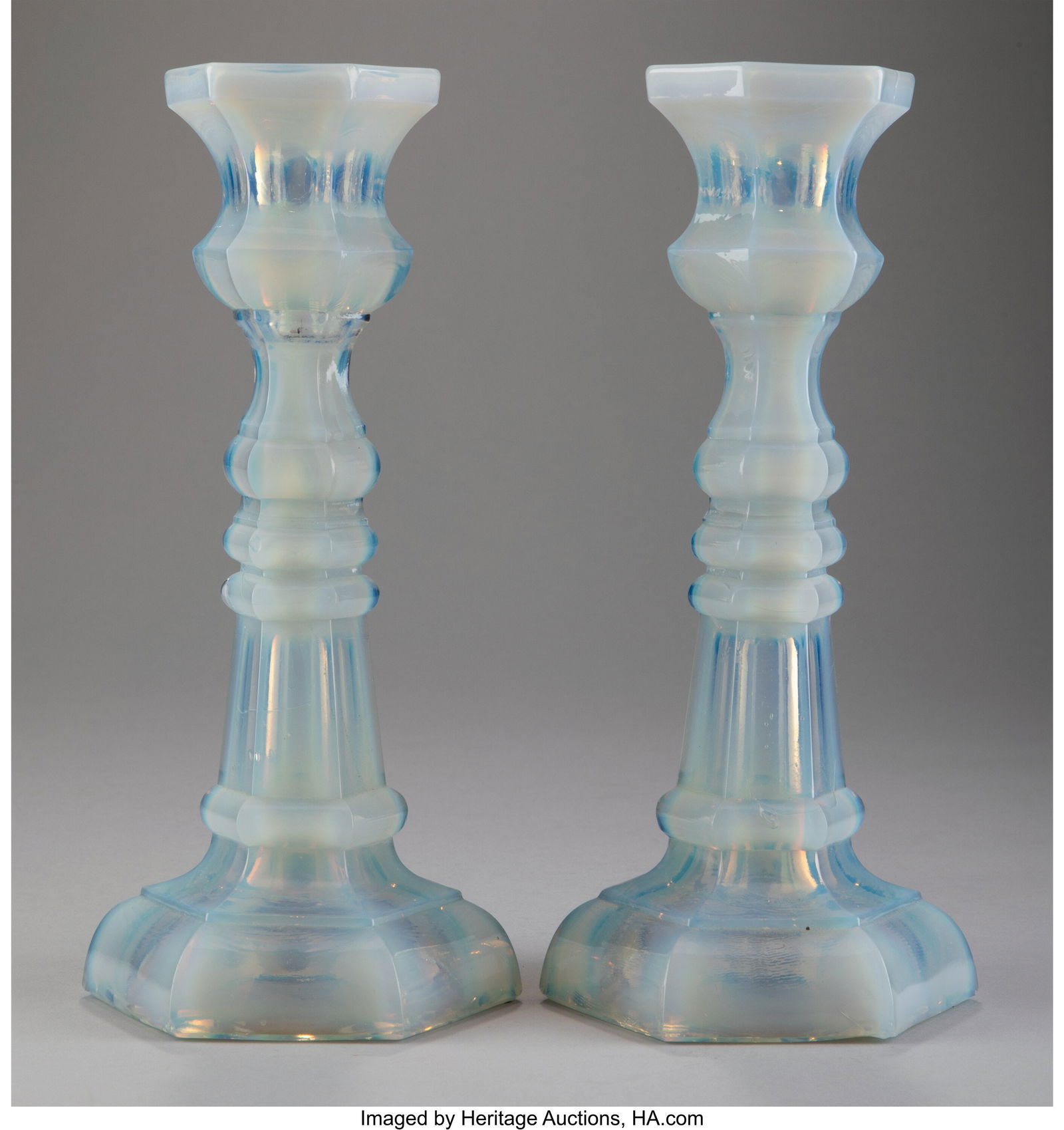 A Pair of American Pressed Opalescent Glass Cand: A Pair of American Pressed Opalescent Glass Candlesticks, circa 1860 9-3/8 x 3-7/8 inches (23.7 x 9.8 cm) (each) PROVENANCE: David & Linda Arm