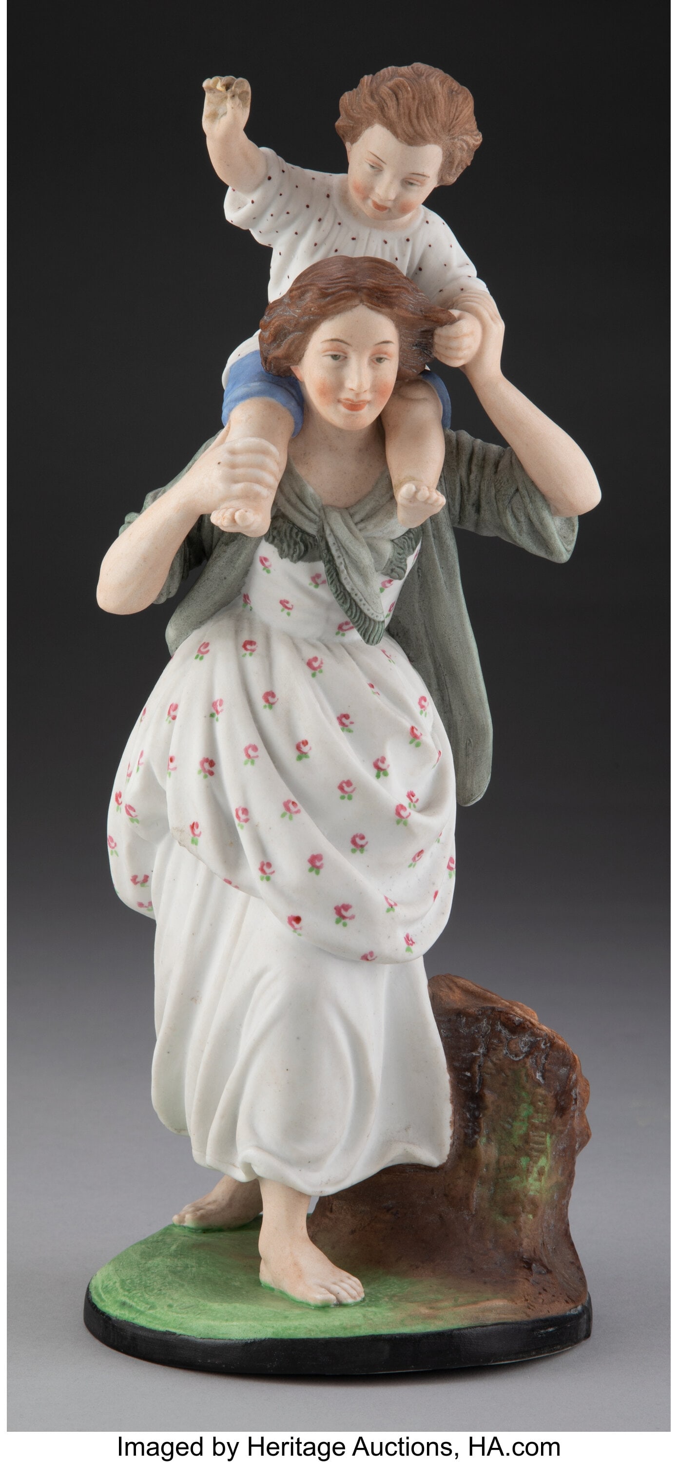 A Gardner Porcelain Factory Figural Group: Woman: A Gardner Porcelain Factory Figural Group: Woman Carrying a Child on Her Shoulders, Verbilki, 19th century Marks: (red underglaze Gardner factory mark), NO. 4, (impressed factory mark), (impressed Cyr