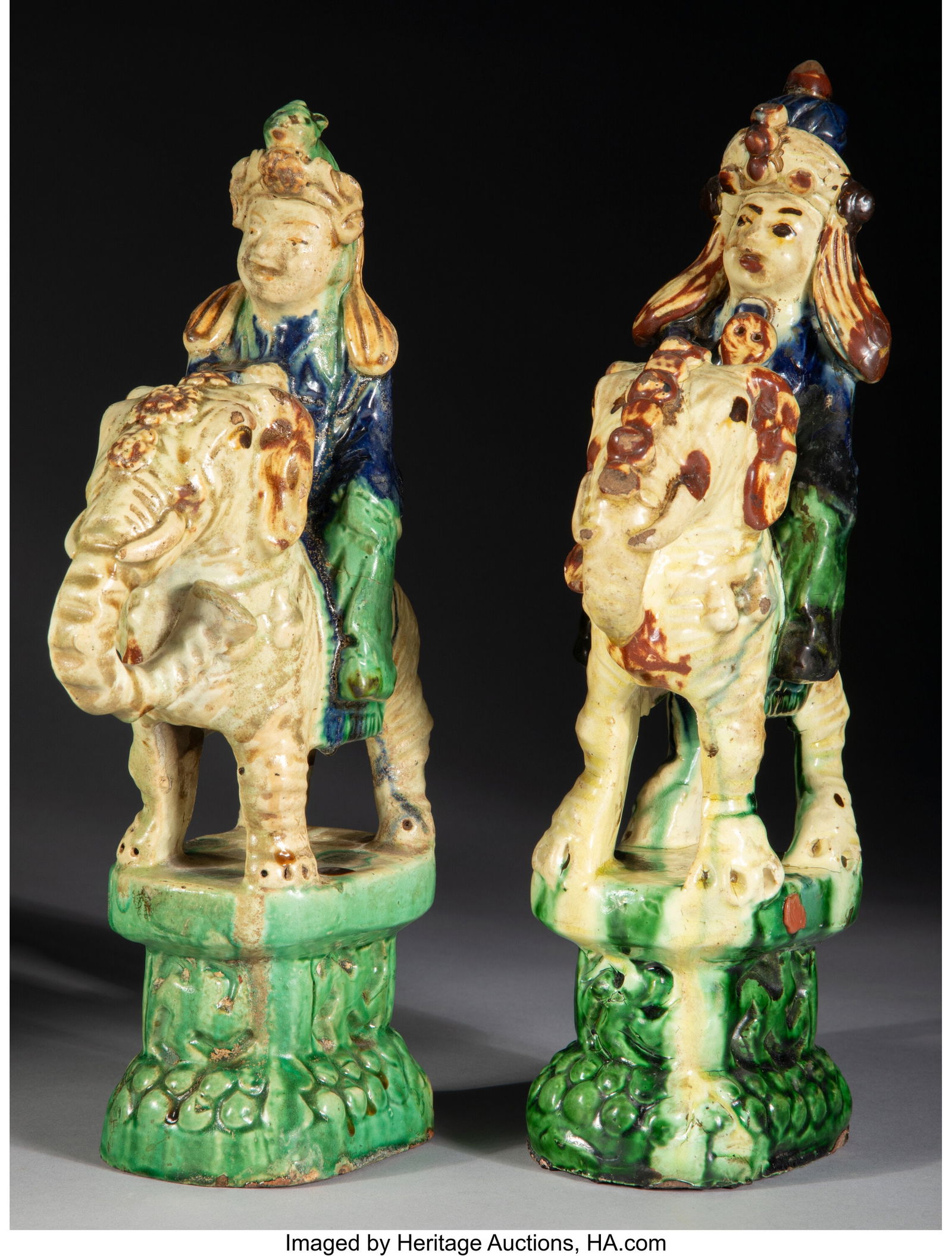 A Pair of Chinese Sancai-Glazed Tilework Figures: A Pair of Chinese Sancai-Glazed Tilework Figures, Song dynasty Marks: (red seal) 12 x 2-3/4 x 5-3/4 inches (30.5 x 7.0 x 14.6 cm) (tallest) PROVENANCE: The Estate of Edward Lane; Sotheby Parke Bernet,