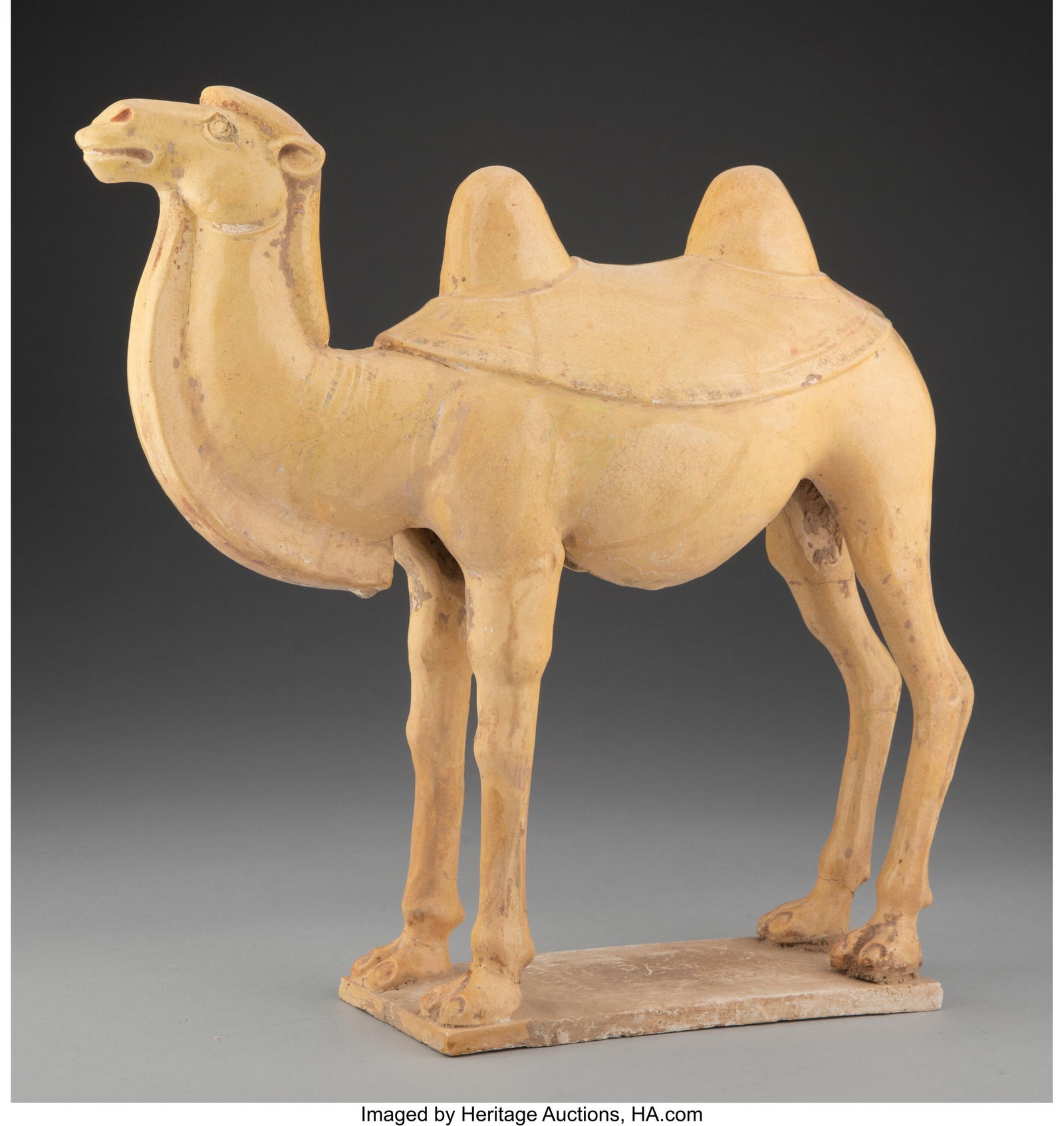 A Glazed Ceramic Standing Camel 13-3/8 x 13-1/2: A Glazed Ceramic Standing Camel 13-3/8 x 13-1/2 x 4-1/2 inches (34.0 x 34.3 x 11.4 cm) Collection of Jonathan Kern to Benefit Charity HID03101062020 © 2