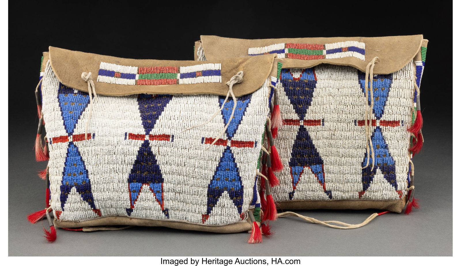 A Pair of Sioux Beaded Hide Possible Bags  c. 18 (1 of 2)