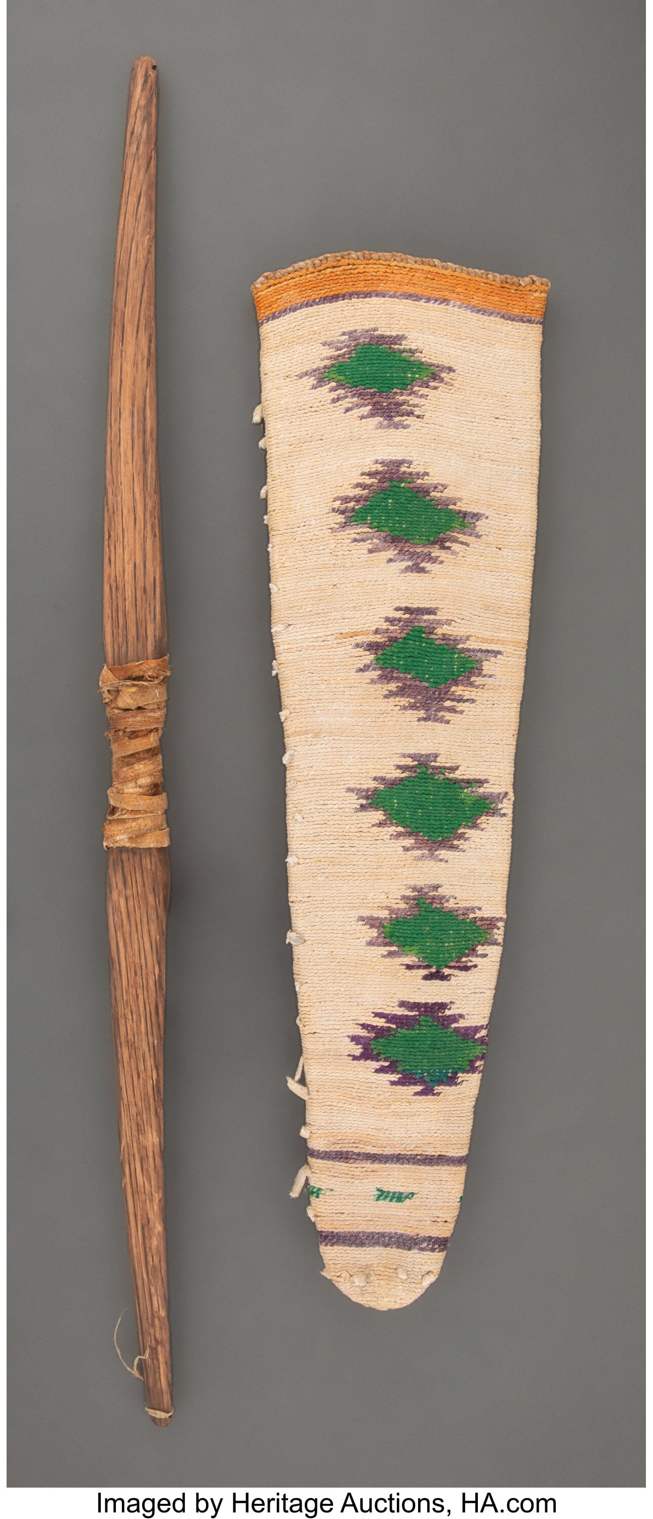 A Nez Perce Twined Cornhusk Quiver and Bow c. 1: A Nez Perce Twined Cornhusk Quiver and Bow c. 1920 natural and dyed cornhusk, wool, hemp; wood, hide, sinew Provenance: A Private Collection, Scottsdale