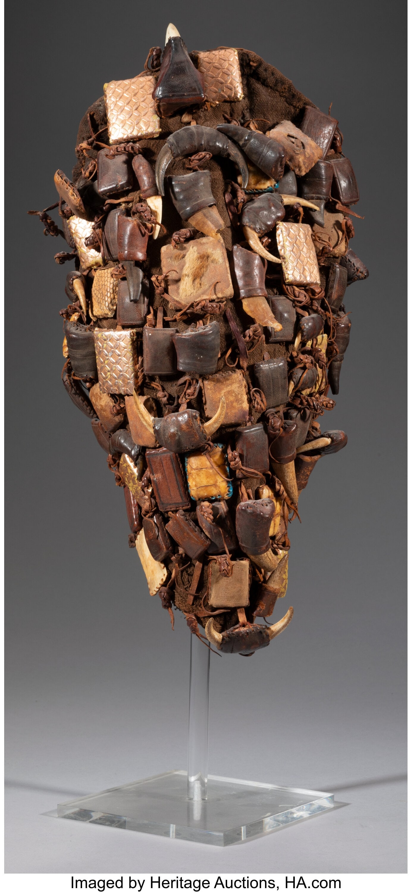A Mande Assemblage Dan, Senufo, or related peop: A Mande Assemblage Dan, Senufo, or related people, Ivory Coast or Mali, early 20th century Most likely a cap or bag for a hunter or medicine man. Native woven cloth cove