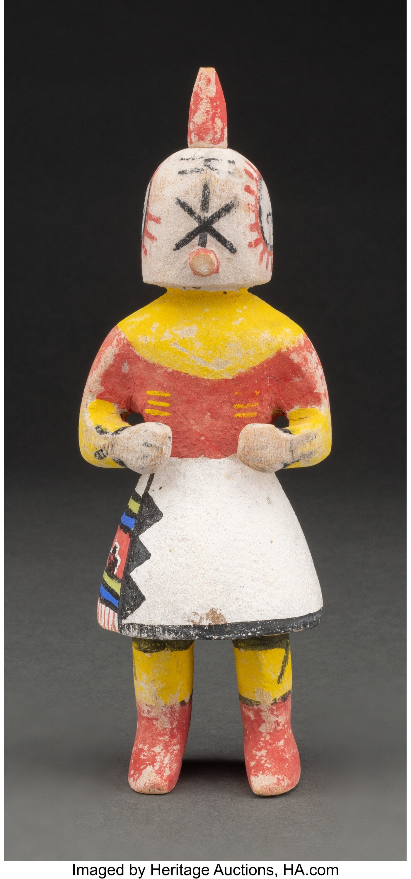 A Hopi Katsina Doll A Rattle Katsina cottonwo: A Hopi Katsina Doll A Rattle Katsina cottonwood, paint, cotton string Provenance: Property of an Upstate New York Collector Height: 7 inches HID03101062020 © 2024 Heritage